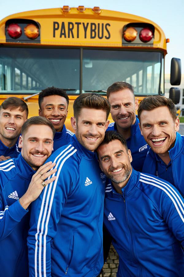 US Schullbus mit Sportler Gruppe